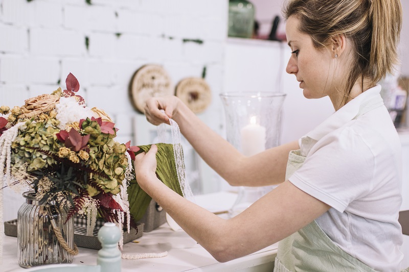 A Lady preserving flowers